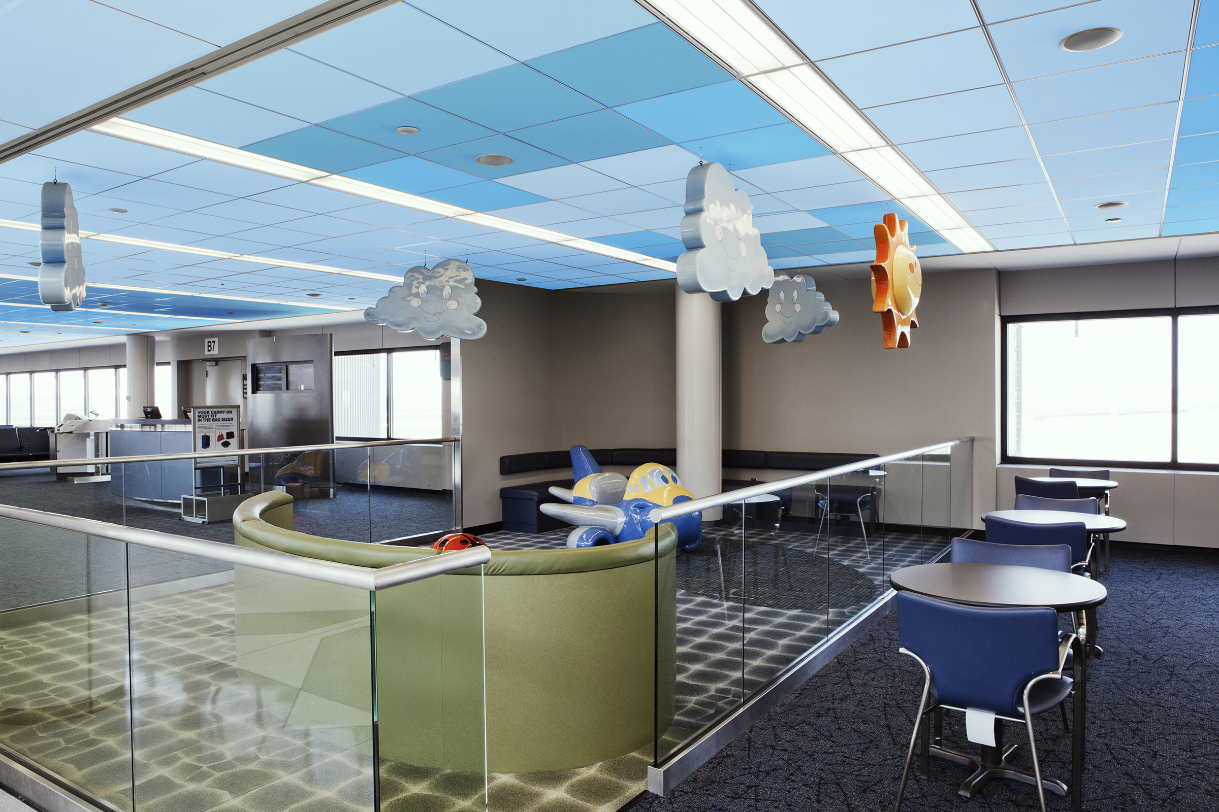 Rochester,united States,an Airport Departure Lounge Children's Play Area With Signs. Tables And Chairs.